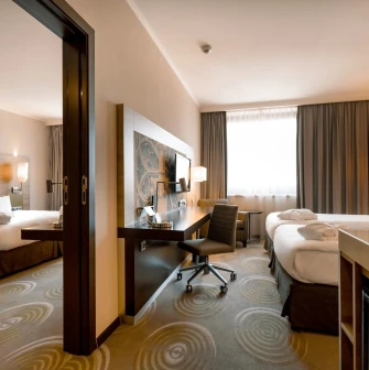 Spacious Holiday Inn Kyiv room with two relaxation areas