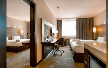 Spacious Holiday Inn Kyiv room with two relaxation areas