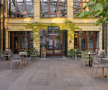 The courtyard of the Bursa Hotel in Kyiv with an outdoor terrace