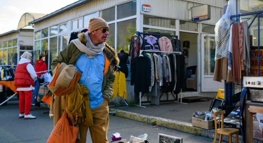 Looking at things at a street flea market near Pochaina station in Kyiv