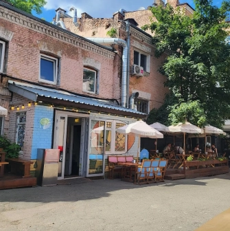 OG Burger in Kyiv - brick building and outdoor terrace