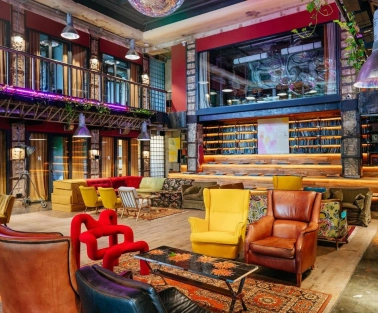 Bright lounge with colored chairs in the interior of Generator in Kyiv