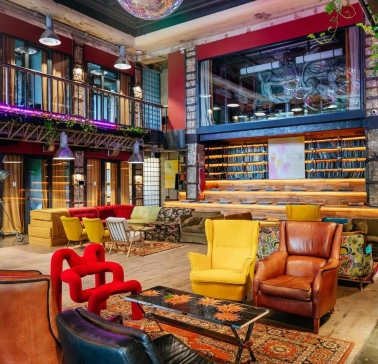 Bright lounge with colored chairs in the interior of Generator in Kyiv