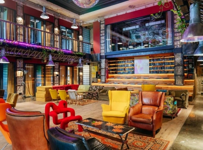 Bright lounge with colored chairs in the interior of Generator in Kyiv