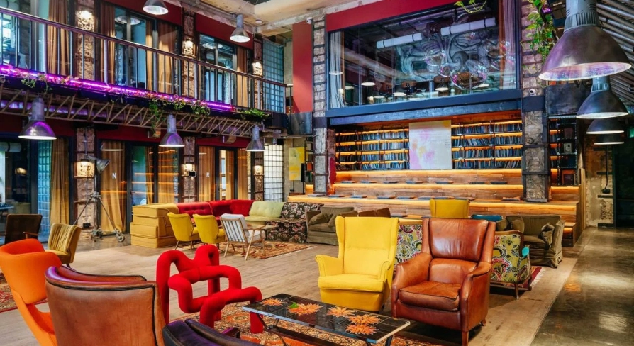 Bright lounge with colored chairs in the interior of Generator in Kyiv