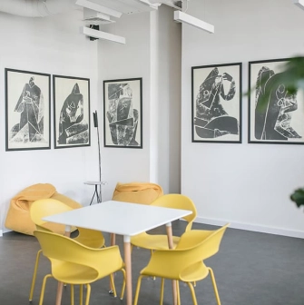 Recreation area with yellow chairs at Peremoga Space in Kyiv
