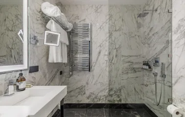 Luxurious marble-finished bathroom at the Edem hotel in Kyiv