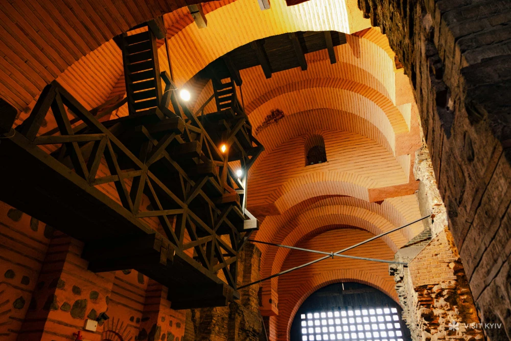 Golden Gate - interior wooden beams and brick arches in Kyiv