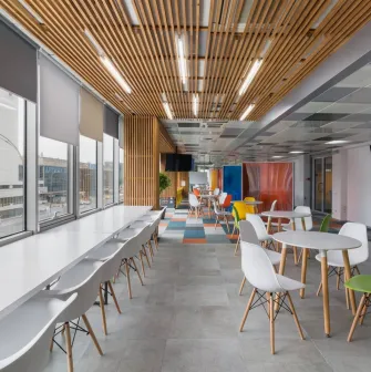 Modern interior of Peremoga Space coworking space in Kyiv with panoramic windows