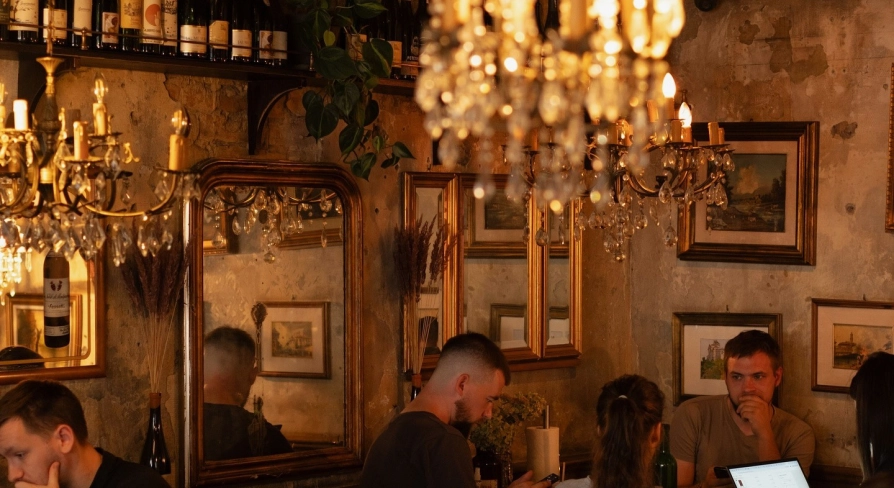 Cozy dining area at Mimosa Brooklyn Pizza restaurant in Kyiv with vintage decor