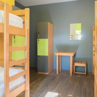 Bright dormitory room with bunk beds at Dream Hostel in Kyiv