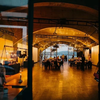 Art-Prychal - restaurant area with simple furniture and river views