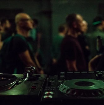 DJ console in front of the crowd at Closer Club in Kyiv