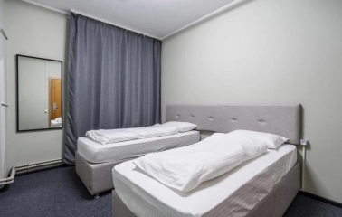 Kyiv Hostel - clean, private twin room with simple furniture