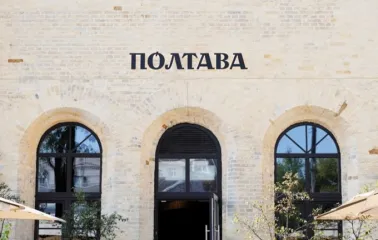 Poltava – restaurant exterior with brick facade and black arched windows