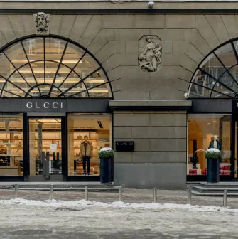 Gucci and Ferragamo store facades at the Passage shopping street in Kyiv