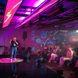 UNIT.City - conference setup with a stage and audience seating