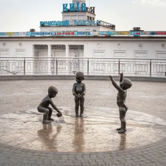 The Toddlers Launching Ships in Kyiv - young founders symbol located on Poshtova Square