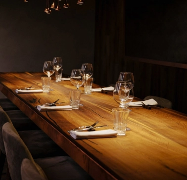 Chef's table - elegant interior, table with wine glasses