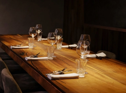 Chef's table - elegant interior, table with wine glasses