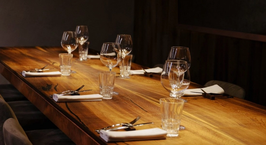 Chef's table - elegant interior, table with wine glasses