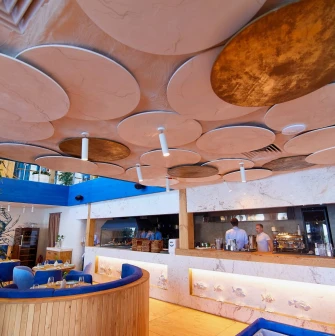 Restaurant Prychal - interior with nautical blue elements and decorative ceiling panels