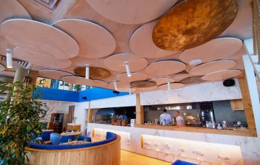 Restaurant Prychal - interior with nautical blue elements and decorative ceiling panels