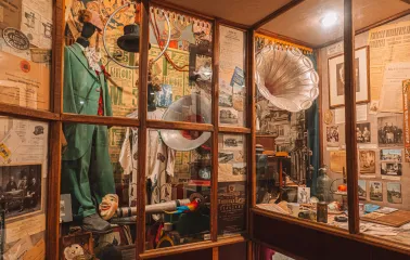 One Street Museum in Kyiv - showcase with costumes and a gramophone