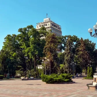 A square in Mariinsky Park with lanterns and a view of the city
