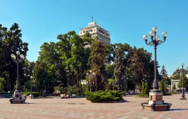 A square in Mariinsky Park with lanterns and a view of the city