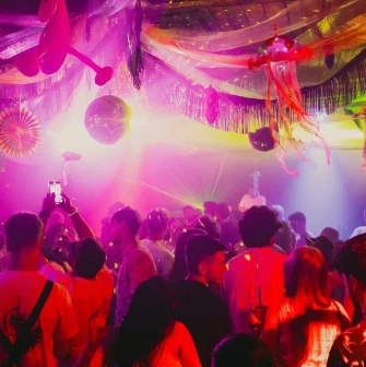 Vechirochka - dance floor with colorful lights and crowd dancing