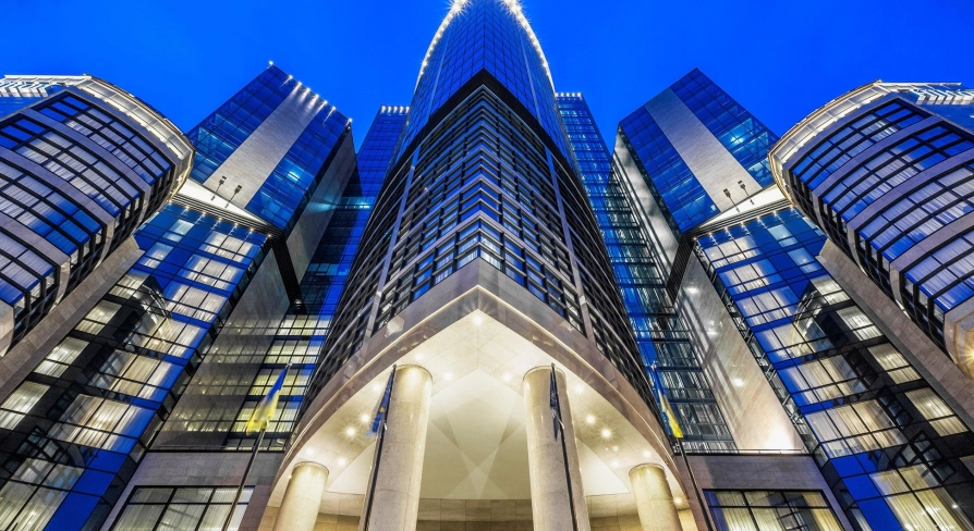Facade of the Hilton Kyiv hotel in the evening