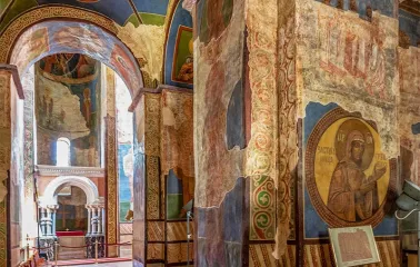 St. Cyril's Church in Kyiv- arched corridor with ceiling medallions and wall murals