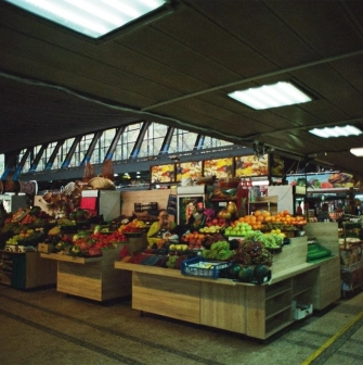 Food aisles with fruits and vegetables inside Zhytniy Market in Kyiv
