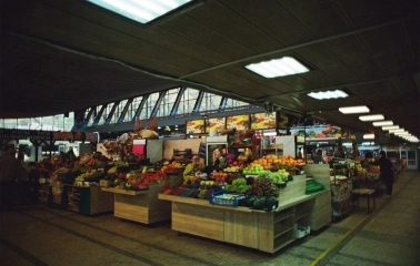 Food aisles with fruits and vegetables inside Zhytniy Market in Kyiv