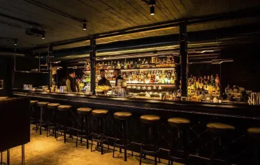 Bar counter with drinks at Hendrick's Bar in Kyiv