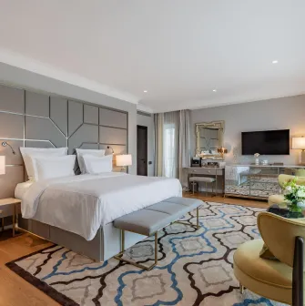 Large comfortable bedroom with designer interior at the Edem hotel in Kyiv