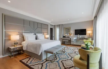 Large comfortable bedroom with designer interior at the Edem hotel in Kyiv
