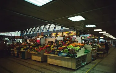 Food aisles with fruits and vegetables inside Zhytniy Market in Kyiv
