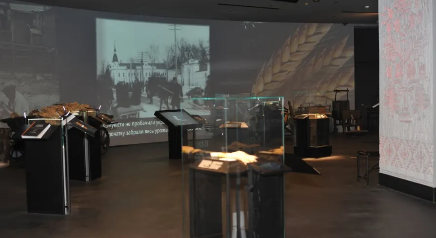 Exhibition hall of the Holodomor museum with historical photographs and exhibits