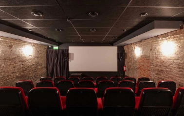 Bursa Hotel - retro-style private cinema room with cushioned seating