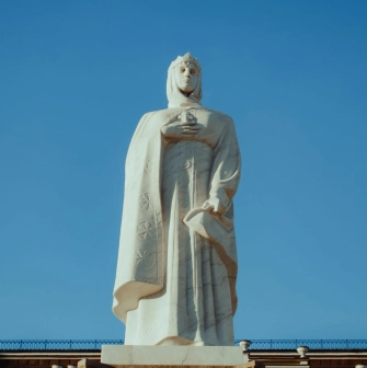 Low angle view of white Princess Olga statue in Kyiv