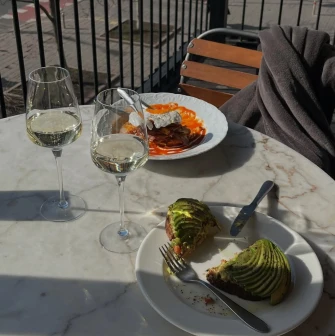 Shalom - large open-air summer terrace with tables set for dining
