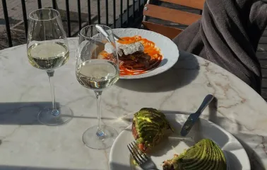 Shalom - large open-air summer terrace with tables set for dining