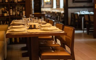 Cozy tables set for dinner at the "Whisky Corner" bar in Kyiv