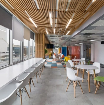 Modern interior of Peremoga Space coworking space in Kyiv with panoramic windows