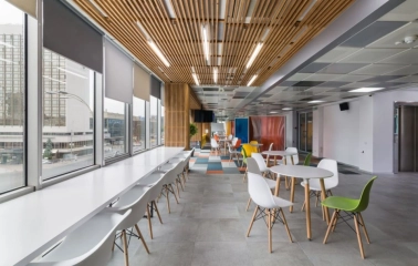 Modern interior of Peremoga Space coworking space in Kyiv with panoramic windows