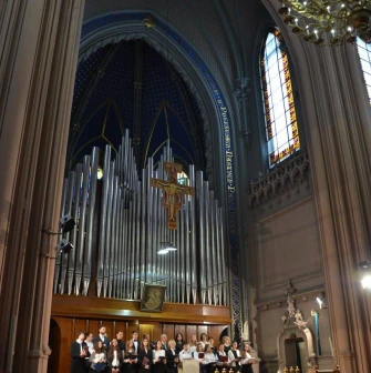 Organ, choir and altar during a performance at St. Nicholas Church in Kyiv