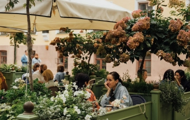 Etre Sofie - street terrace with comfortable seating and a view of the facade