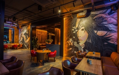 Favor Park Hotel - well-lit interior hall with seating and modern design